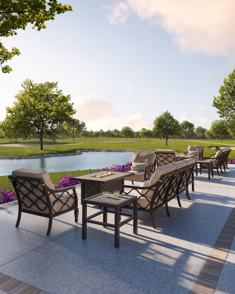 Outdoor patio set with chairs and table by a pond on a sunny day