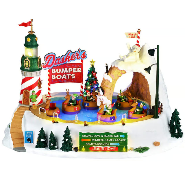 This image shows what this Lemax piece looks like on a white background. It was designed to look like a winter-themed carnival ride. It looks like a lighthouse next to a frozen pond. The ride looks like reindeer boats floating around a Christmas tree.