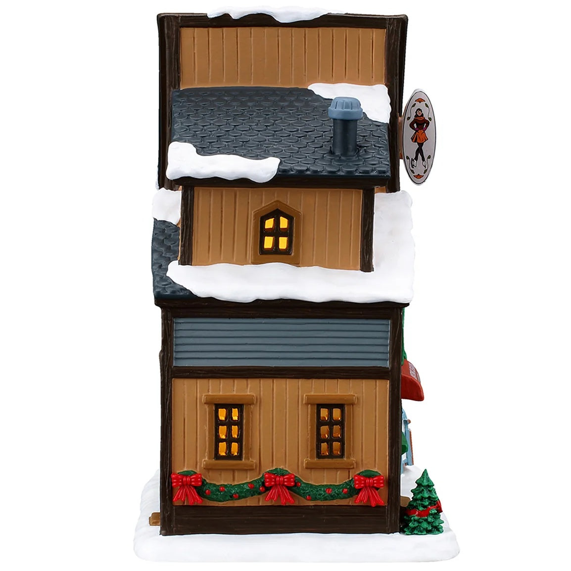 This image shows what the other side of this building looks like. There's a green garland with red bows.