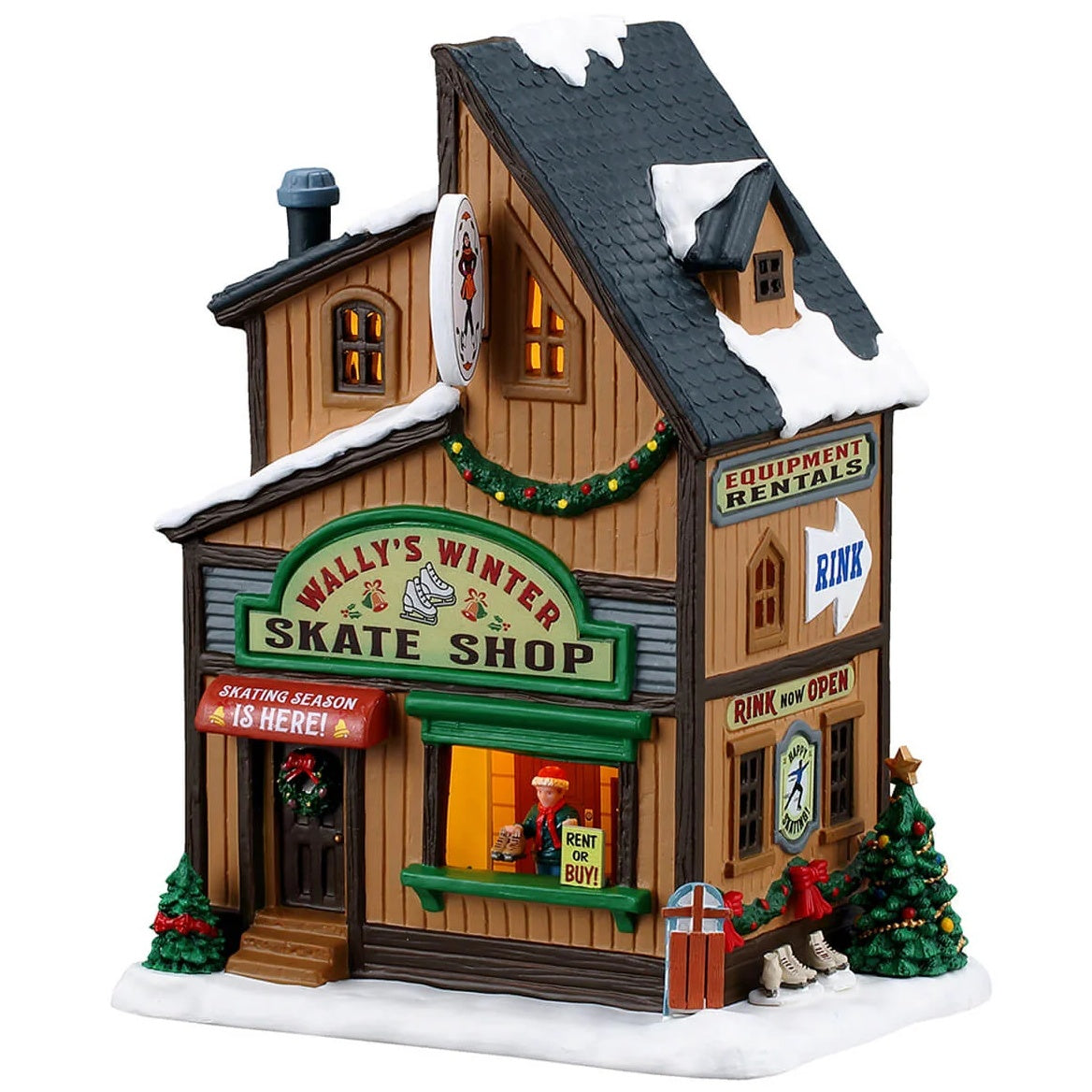This image shows what this Lemax building looks like on a white background. It was designed to look like a tall skate shop. There's a window near the front door where there's a person ready to give you skates in your size. There are signs that read "Wally's Winter Skate Shop," "Skating Season is Here!," "Rent or Buy!," "Equipment Rentals" and "Rink is Open!"