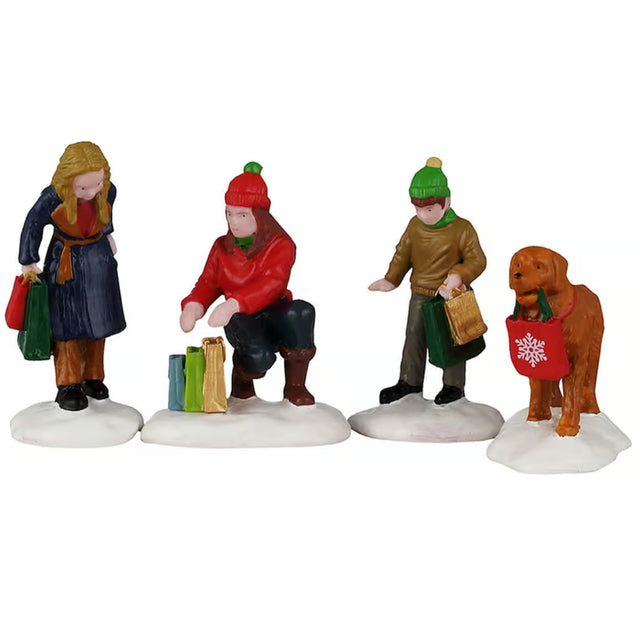 This image shows what these four figurines look like on a white background. The scene is supposed to look like a mom, her two kids and their dog shopping in the snow.