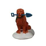 This image shows a golden retriever type dog standing in snow holding a blue shovel in his mouth.