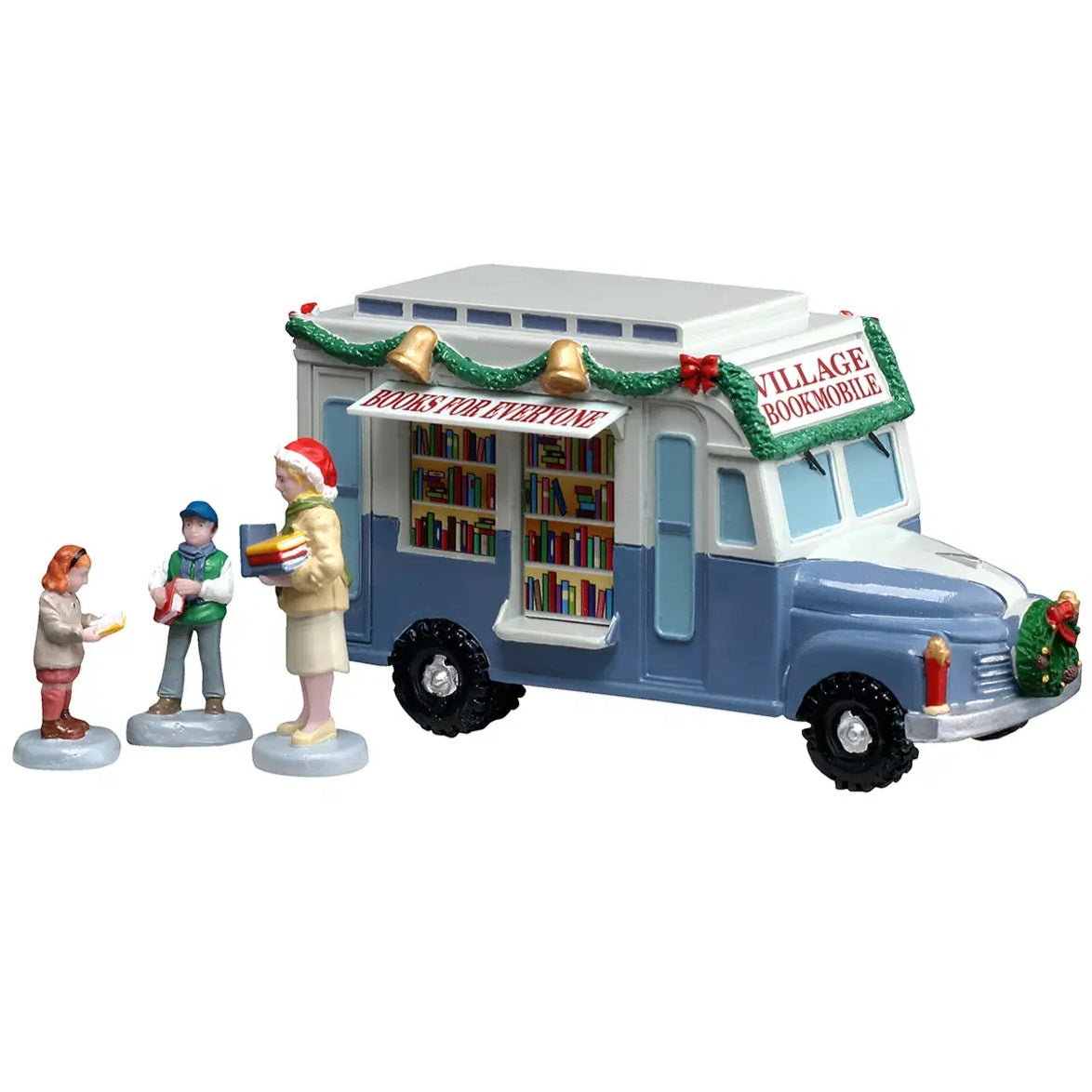 This image shows what this Lemax table accent looks like on a white background. It's designed to look like a bus with books on it. There are two kids talking to the librarian outside the van. There are signs on the van that read "Books for Everyone" and "Village Bookmobile."