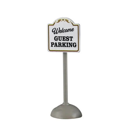 This image shows what one of the signs looks like on a white background. This one reads "Welcome Guest Parking." The pole is silver and the sign is white with black text and  gold trim.