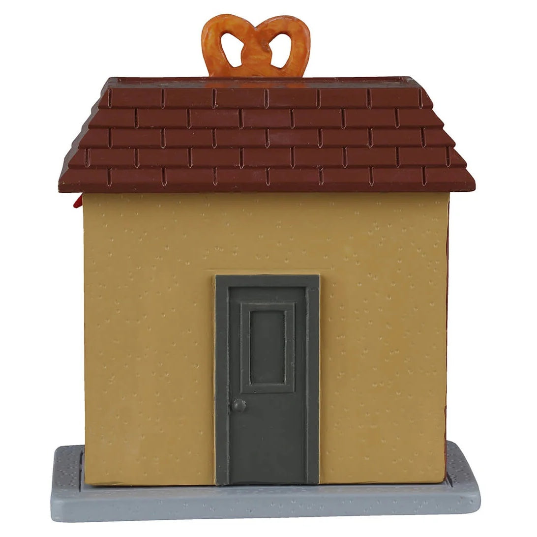 This image shows what the back of this table accent looks like. There's a gray door.