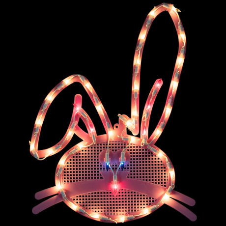 This image shows what the lighted bunny decoration looks like on a black background.