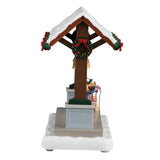 This image shows what this piece looks like from the other side. The top near the roof is decorated with a wreath.