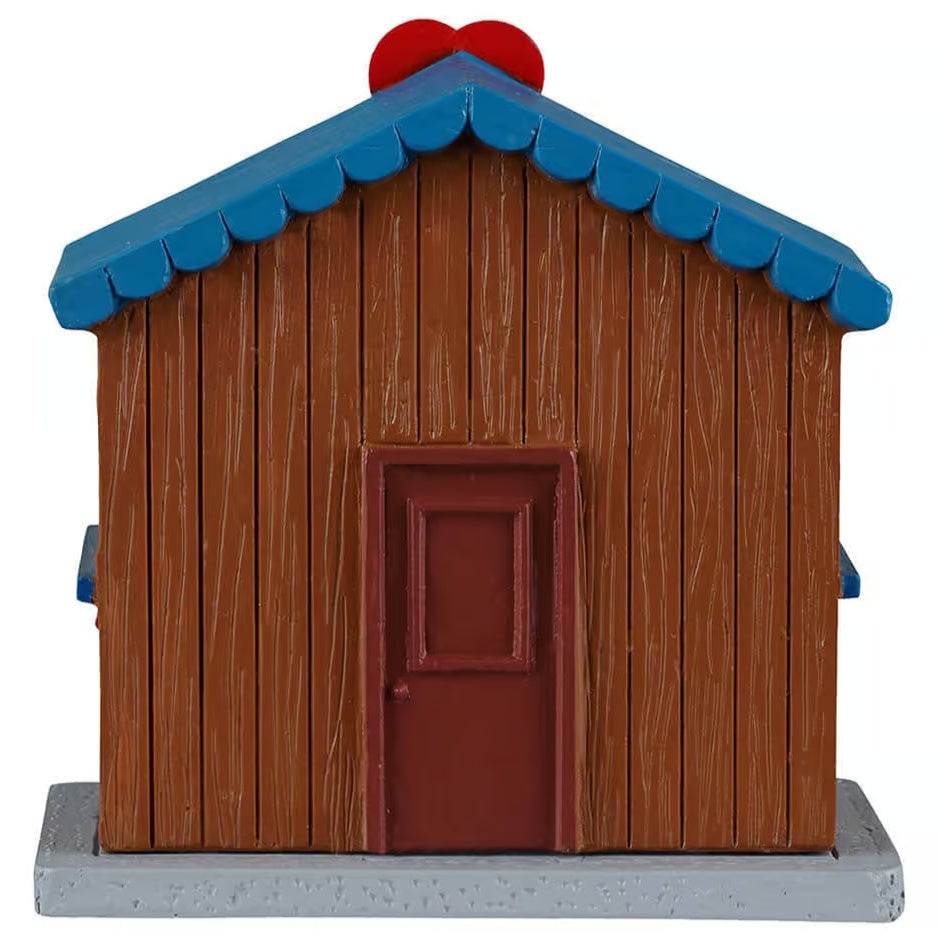 This image shows what the back of this table accent looks like. There's a brown door.