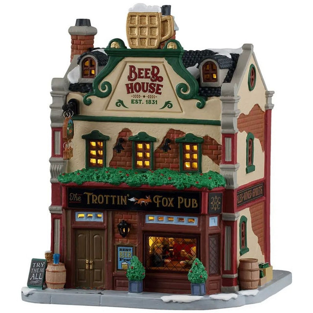 This image shows what this Lemax building looks like on a white background. It was designed to look like a tall cottage turned into a pub. There's a large, fake gold mug of beer on the roof. There's a window near the front door and you can see people drinking inside. There are kegs of beer and potted trees on the sidewalk, along with snow.