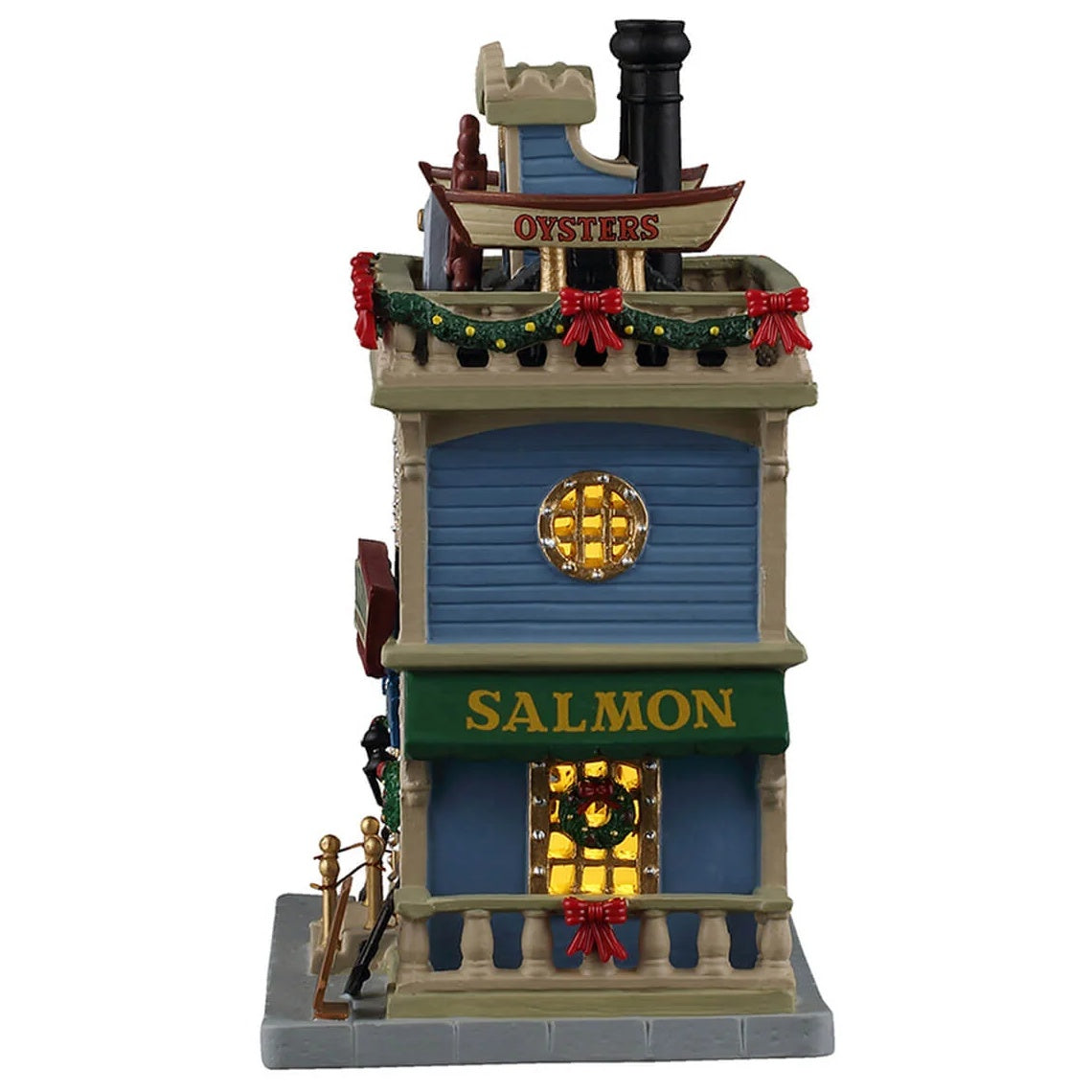 This image shows what the other side of this building looks like. The boat on the roof reads "OYSTERS." The green awning over the window reads "SALMON."
