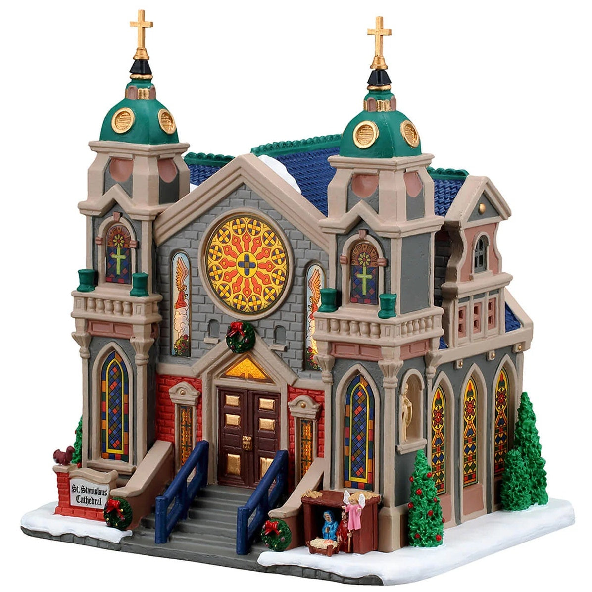 This image shows what this Lemax building looks like on a white background. It was designed to look like a very large, intricate cathedral. There are gold steeples, gold crosses and stained glass windows. There's a nativity scene near the front door.