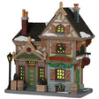 This image shows what this Lemax building looks like on a white background. It was designed to look like an old time-y cottage turned into a liquor store. There's some snow on the roof and on the sidewalk. There's green garland and decorated wreaths all over. There are kegs and glass bottles sitting on the sidewalk in front of the building.