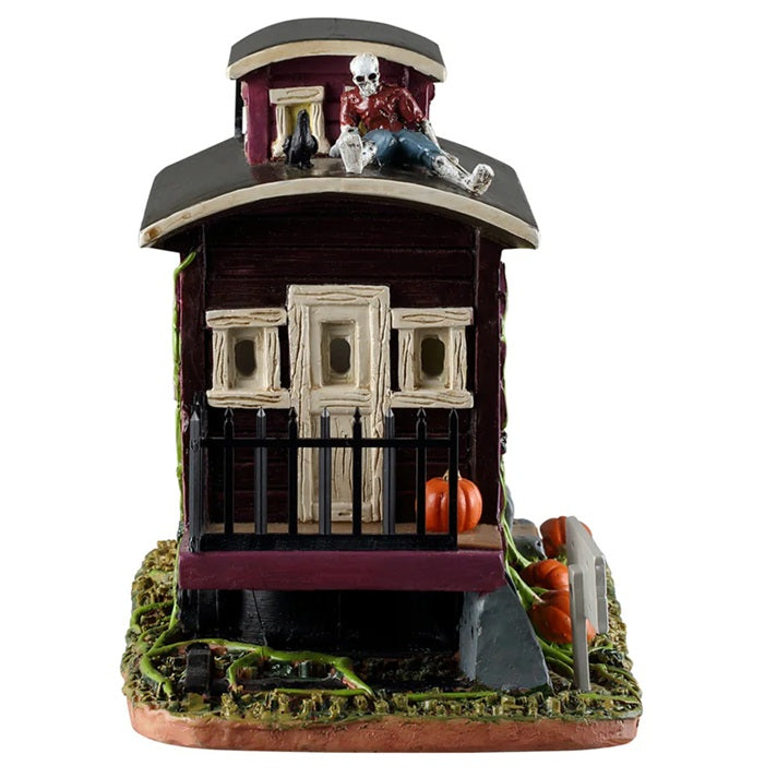 This is another angle of the caboose. There's a skeleton resting on the roof.