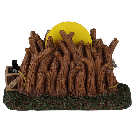 This image shows what the back of this product looks like. It's a bunch of bare trees with the tops cut off. You can see part of the yellow moon.