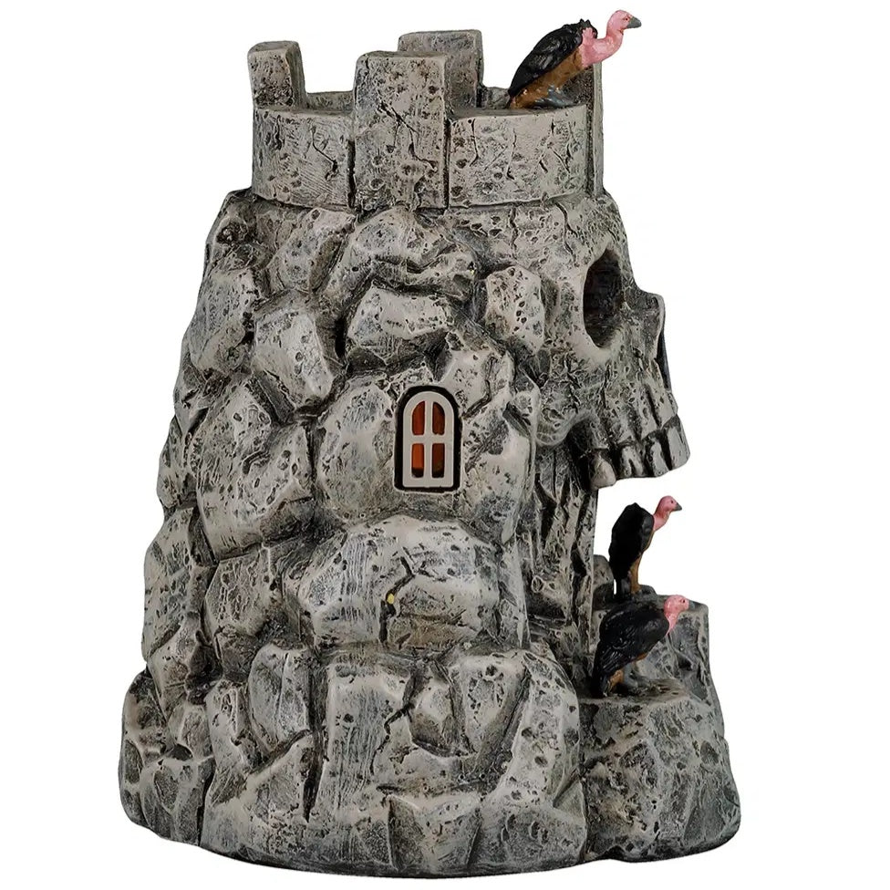 This image shows what the other side of the castle looks like. There's a small window where you can see the orange glow inside.