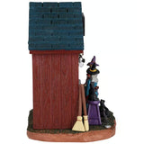 This is a side of the table accent. You can see two broomsticks, a black cat and a rat on the ground.