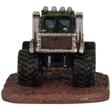 This image shows what this monster truck looks like from behind. The truck bed is filled with dirt and skeletons.