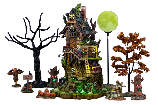 This image shows what this Lemax Spooky Town house set looks like all set up on a white background.