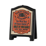 This Lemax sign is a burnt orange color, as well as a pale yellow and black. It reads "Tarot Card Readings. See what your future holds only if you dare. Love, fate, destiny."