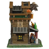 This image shows what the lighted building looks like from the other side. There's a wanted poster above a window.