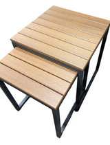 This image shows these nesting tables on a white background. The frames are a dark gray color and the tabletop is antique mahogany.