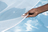 This image shows a hand gripping the mesh to show how it rests on the surface of the water.