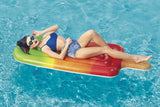This s a lifestyle image showing a woman posing on the pool float in the pool.