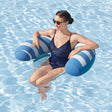 This is a lifestyle image showing a woman sitting in the mesh pool chair in the middle of the pool.