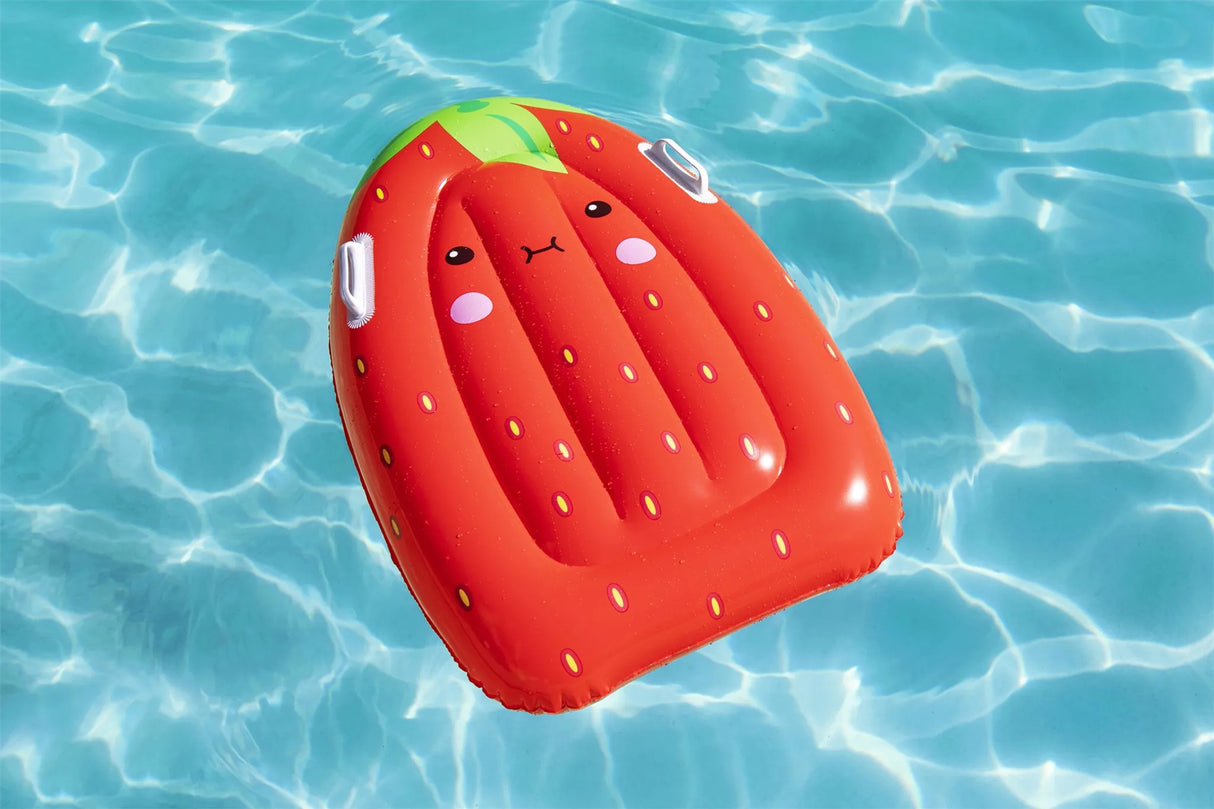 This is a lifestyle image showing the strawberry surf rider float in the water.