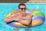 This image shows a man inside the inner tube with his arms crossed on the side.