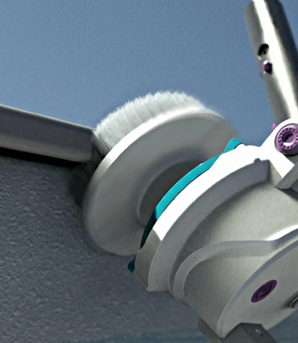 This image shows the brush in use cleaning the side of a pool.
