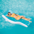 This is a lifestyle image showing a woman resting on this inflatable chair in a pool.