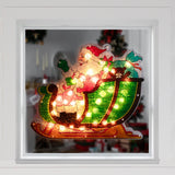 This is a lifestyle image showing this Santa Claus decoration hanging in a window.