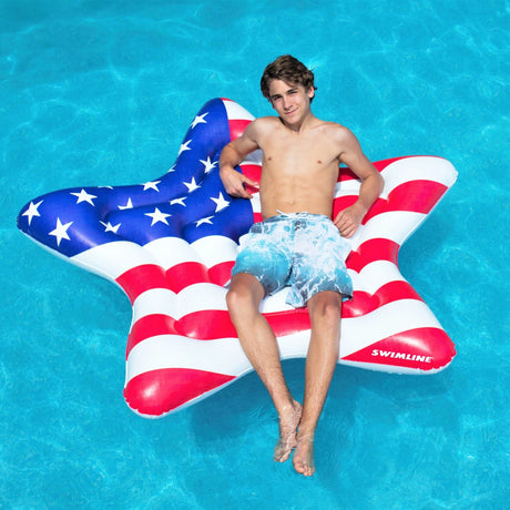 This is a lifestyle image showing a boy resting on this inflatable float in a pool.