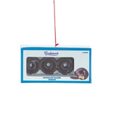 This image shows the ornament designed to look like a box of chocolate glazed donuts.