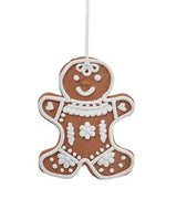This image shows the ornament shaped like a gingerbread man. It has white "frosting" accents designed to look like he's wearing clothes. The frosting also makes it look like he has hair, two eyes and a mouth.