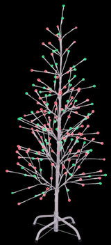 This image shows the white wrapped fake birch tree on a black background. The branches have green and red LED lights.
