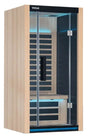 Light brown colored home sauna that fits 1 person. The lights inside the sauna can be changed. The lights in this image are blue.