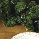 This is a lifestyle image showing the multi-colored lights in a green pine garland.