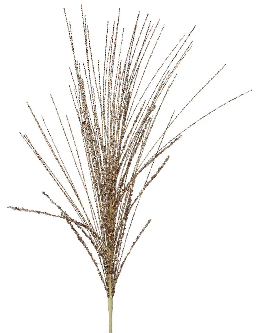 This is an image of a pick spray designed to look like twisted, metallic branches in a champagne gold color.