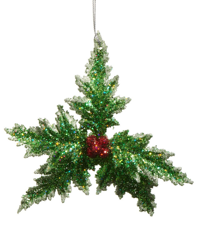 This image shows the ornament designed to look like holly leaves and berries covered in glitter.