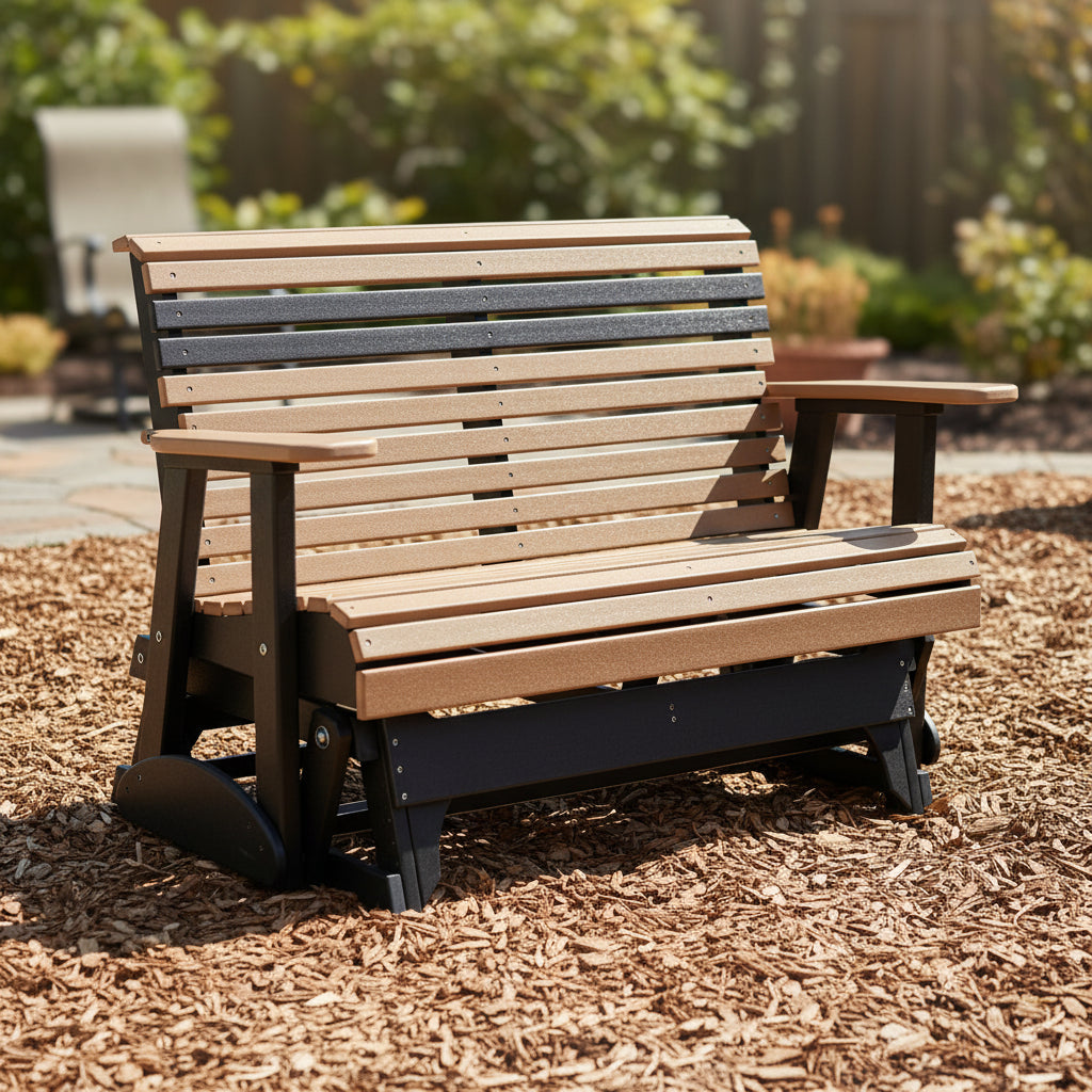 This is a lifestyle image showing this classic glider bench on a patio made of woodchips.