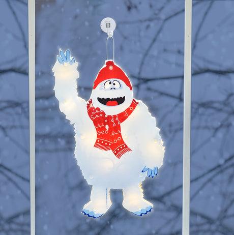 This is a lifestyle image showing the Bumble decoration hanging in a window.