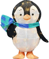 This image shows Wade the penguin sculpture on a white background. The penguin is black and white with a cute quizzical expression on his face. His feet are orange. He's wearing a green and periwinkle striped scarf. The LED lights inside are turned on.