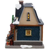 This is the other side of the building. The top part is tan colored and the bottom part is gray and blue bricks.