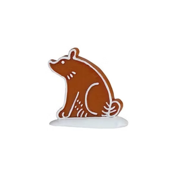 This figurine is shaped like a bear sitting down.