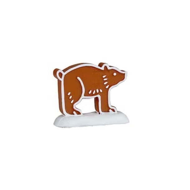 This figurine is shaped like a bear standing on all four legs.