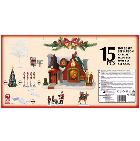 This is the back of the box showing all the pieces that come with it. There are two trees, two village signs, four lamp posts, a building, four figurines and two adaptors.