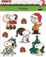 This is one of the options available for these Peanuts clings. Charlie Brown is sitting down holding a red dog bowl and Snoopy's head is peeking out, licking Charlie Brown's face. Linus is wearing a red and white Santa hat. There are three Snoopy stickers. One of them, he's wearing a red and green winter hat while Woodstock is next to him inside a red stocking. Another one, him and Woodstock are tangled up in Christmas lights. And the last one, him and Woodstock are looking at a decorated Christmas tree.