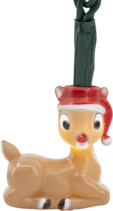 This image shows one of the Rudolph lights. Rudolph the red nosed reindeer has on a Santa hat and is in the laying down position.